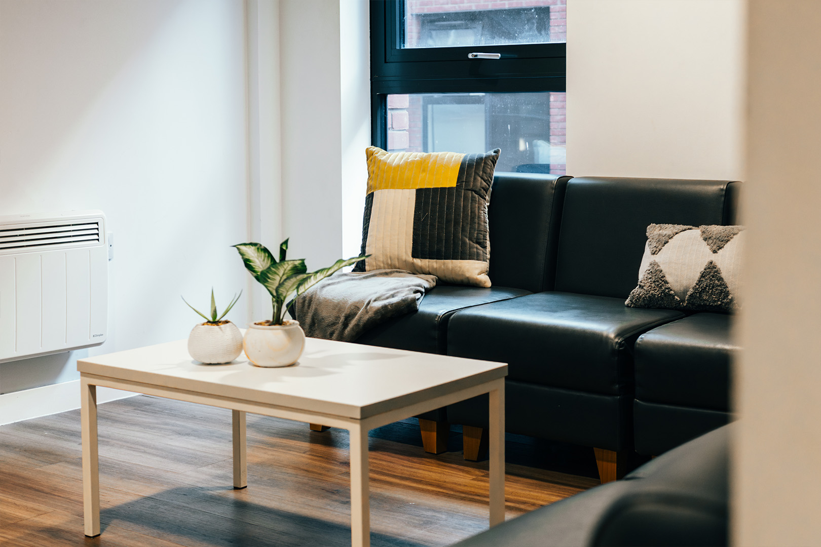 Coffee table in front of a sofa