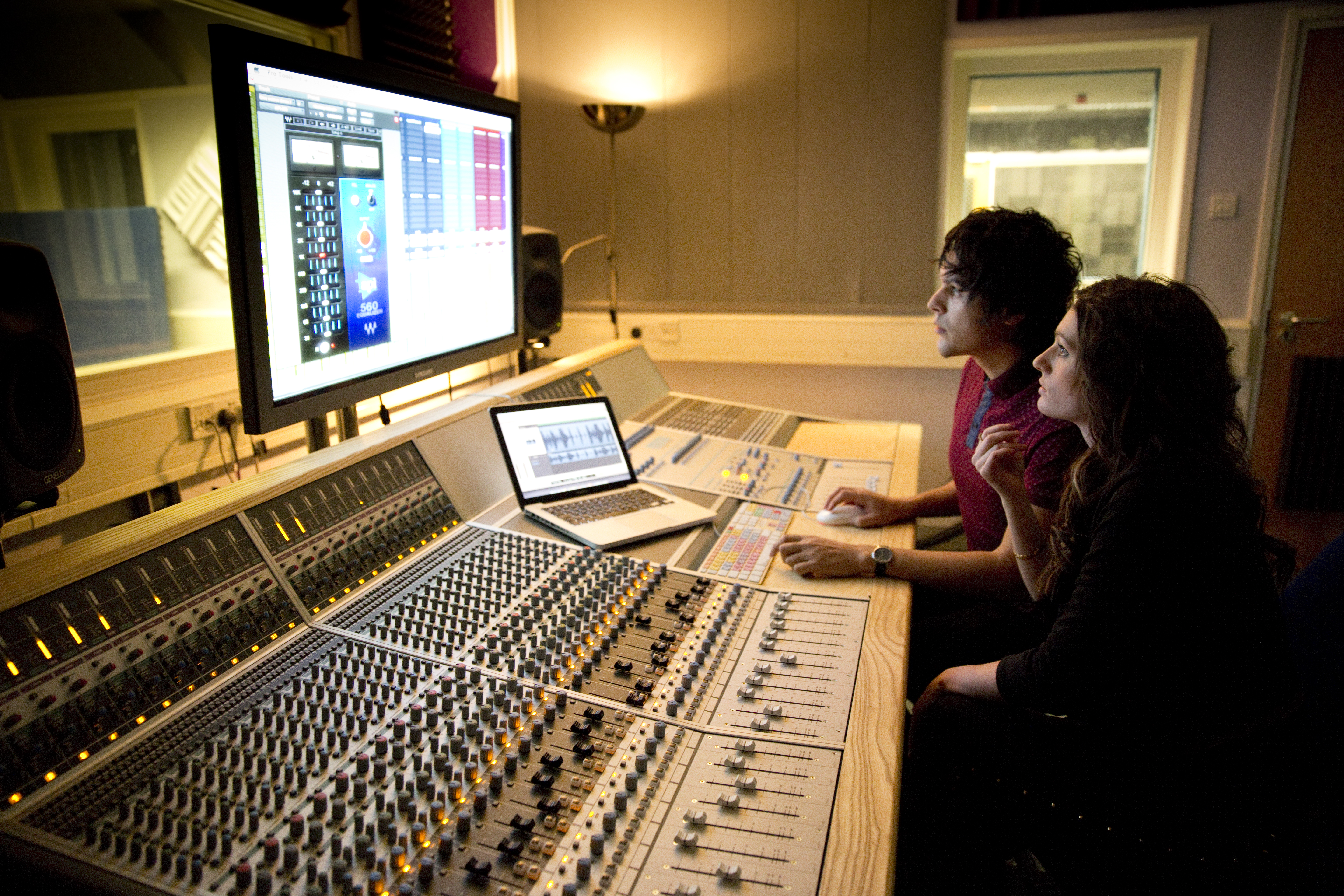 Students on mixing desk