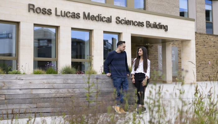 Two students outside of the Ross Lucas Medical Sciences Building