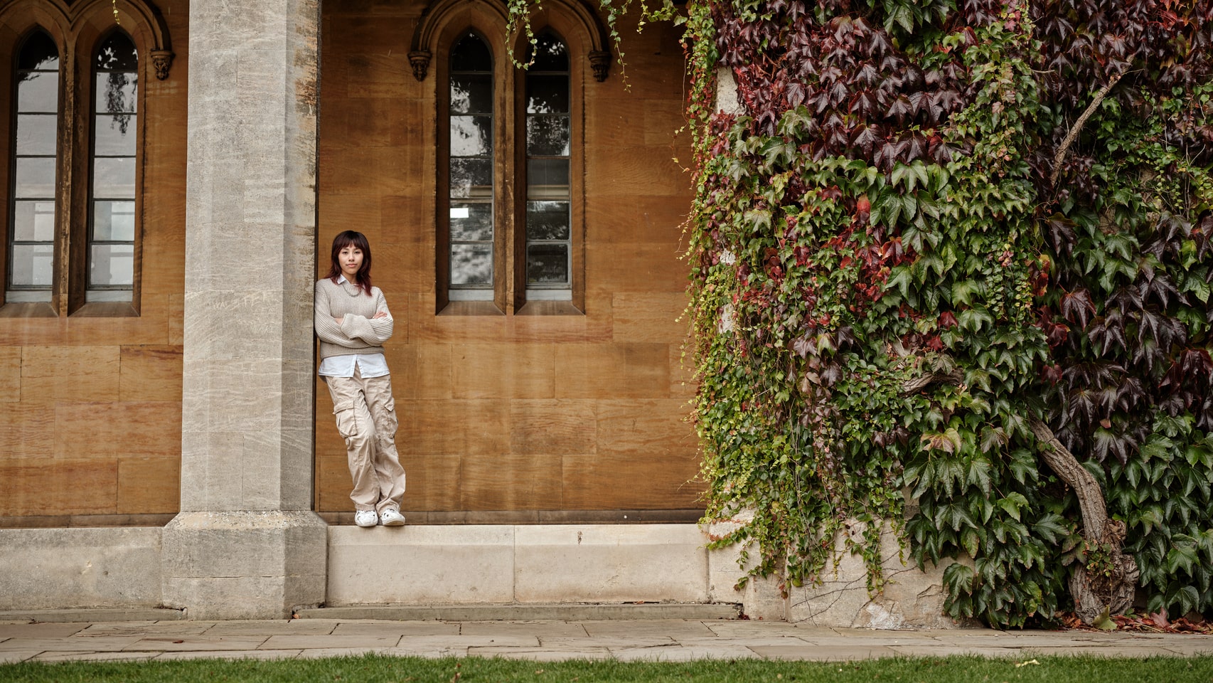 A student stood at Lincoln Castle