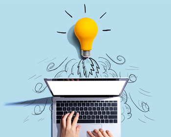 Image of a laptop with a light bulb above it