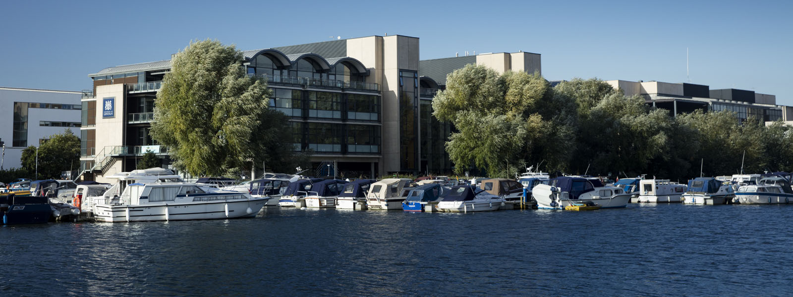 University of Lincoln Minerva Building with Brayford Pool and boats